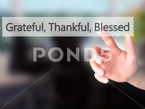 Grateful Thankful Blessed - Hand pressing a button on blurred ba Stock Photos