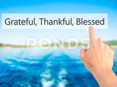 Grateful Thankful Blessed - Hand pressing a button on blurred ba Stock Photos