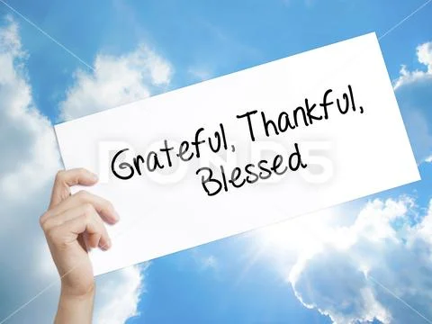 Grateful Thankful Blessed Sign on white paper. Man Hand Holding Stock Photos