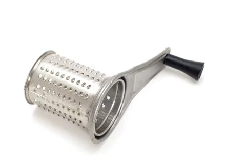 Grater for cheese macro Stock Photos