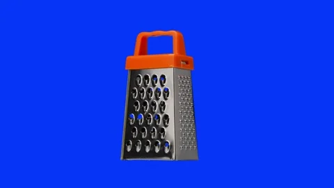 Grater Spinning in Blue Screen. Kitchen accessory shot in 4K Stock Footage 151362668