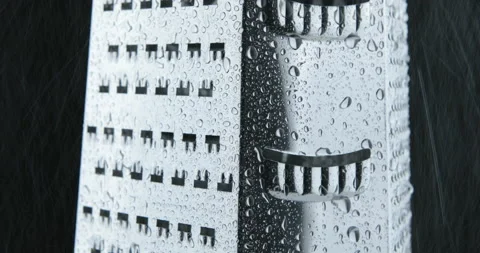 Grater for vegetables. Kitchen accessories. Tools for cooking. Stock Footage 107347359