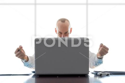 Gratified Businessman At Desk Stock Photos