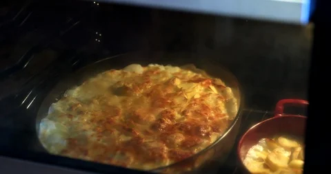 Gratin Dauphinois Baking In The Oven Stock Footage 100714230