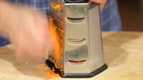 Grating a Carrot Close Up Stock Footage 81276819