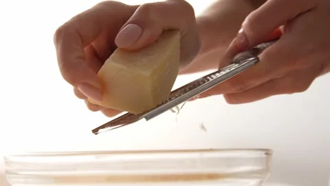 Grating cheese. Close-up. Stock Footage 251824434