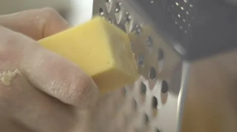 Grating cheese Stock Footage 12590284