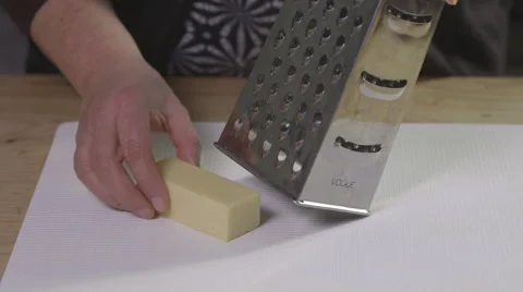 Grating cheese Stock Footage 64021341