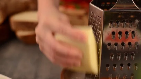 Grating cheese footage Stock Footage 75329378