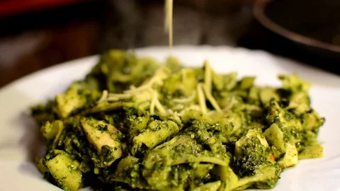 Grating a cheese on pasta 動画素材 70770152