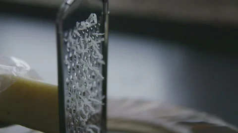 Grating cheese slow motion Stock Footage 57639153