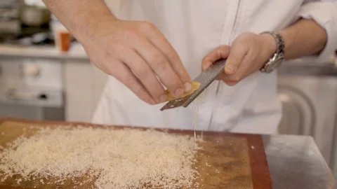 Grating Cheese Slow Motion In Kitchen Stock Footage 127036507