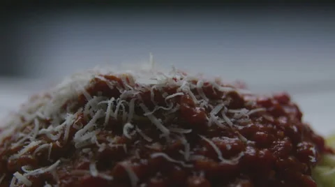 Grating cheese on spaghetti time lapse Stock Footage 57639151