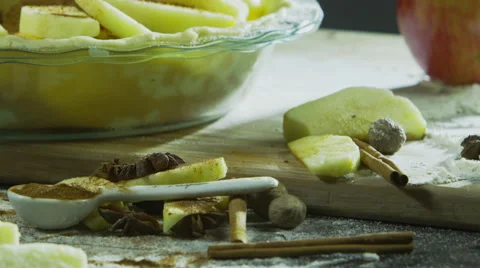 Grating cinnamon onto sliced apples Stock-Footage 67359225