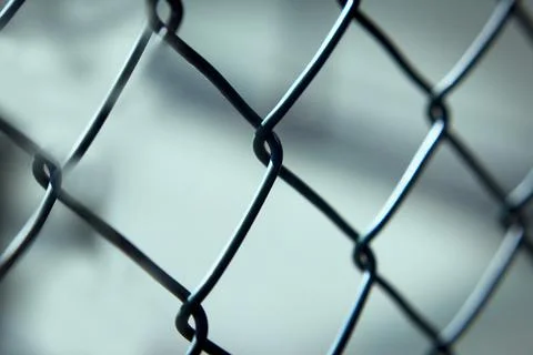 Grating with defocused rhombus shaped background Stock Photos