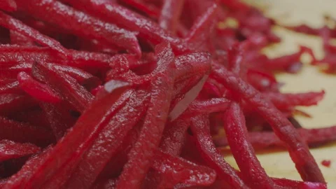 Grating fresh beets Stock Footage 98296143