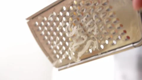 Grating Fresh Cheese Close-up. Stock Footage 255745977