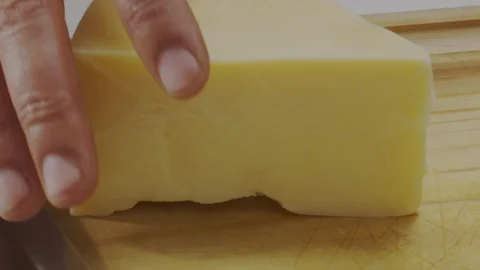 Grating fresh cheese Stock Footage 98295959