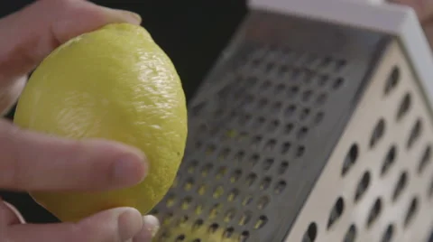 Grating a lemon Stock Footage 64016701