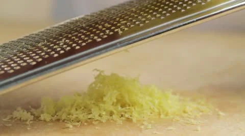 Grating lemon peel Stock Footage 24665823