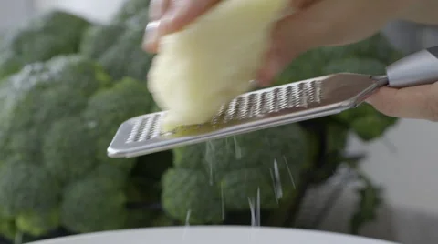 Grating parmesan cheese fast Stock Footage 63779965