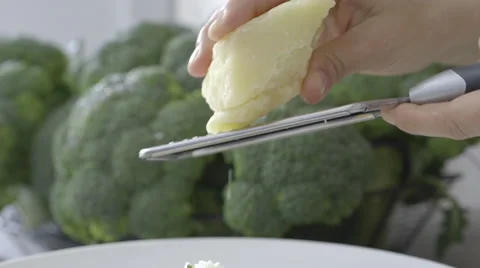 Grating parmesan cheese slow Stock Footage 63779457