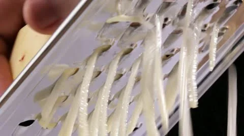 Grating a potato Video stock 22261027