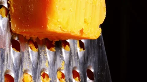Grating red Chedder cheese Stock Footage 220737870