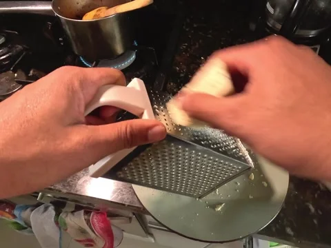 Grating white cheese Stock Footage 319947431