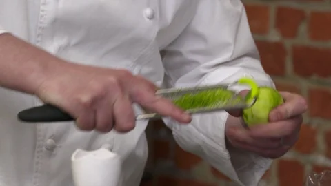 Grating zest of lime Stock Footage 92059268