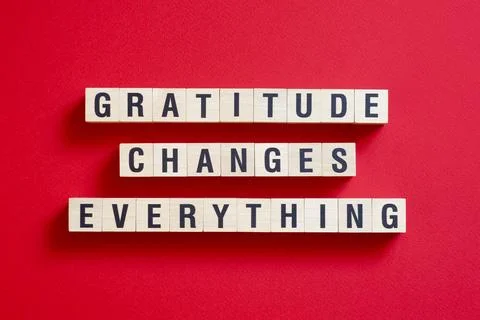Gratitude changes everything - word concept on cubes, text, letters Stock Photos