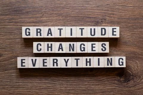 Gratitude changes everything - word concept on building blocks, text Stock Photos