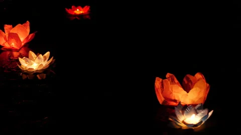 Grave candles at night in the lake 库存影片 140651205