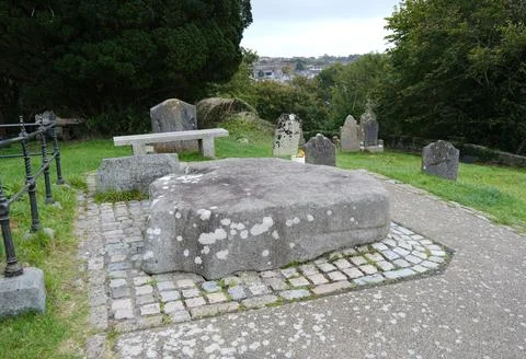 Grave of Saint Patrick marked by a granite memorial stone at Down Cathedral Stock Photos