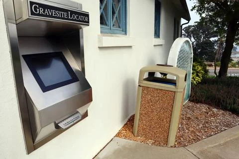 Gravesite locator computer and printer located in the entrance of Cemetery 스톡 사진