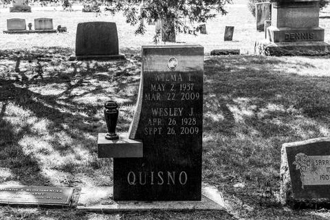 Gravestone with an urn Stock Photos