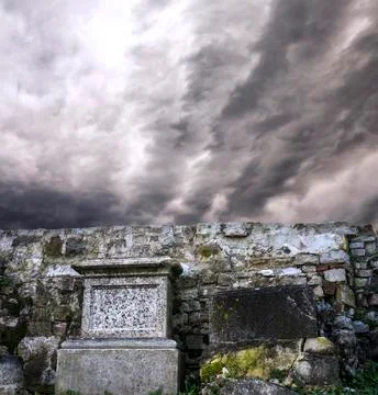 Gravestones with dramatic clouds scene Foto stock