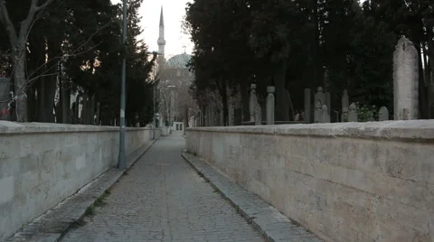Graveyard and the narrow streets of the city Stock Footage 64916341