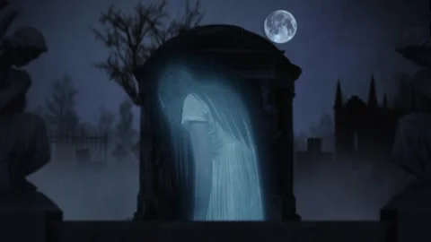 Graveyard, cemetery. Ghost stands in the center of the frame. Statues on the Video stock 252200652