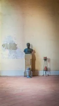 Graveyard, detail of an old bust with empty pottery Stock Photos
