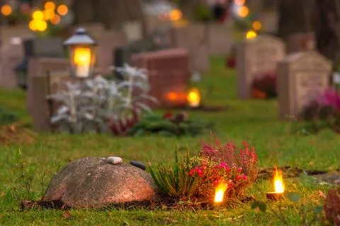 Graveyard at evening Stock Photos