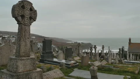 Graveyard overlooking stormy sea Video stock 197756647