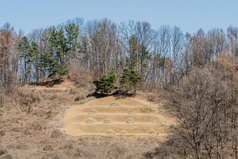 Graveyard on side of mountain Stock Photos
