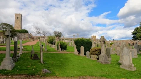 Graveyard with St Rule's Tower in background, St Andrews, Scotland Stock Footage 328258122