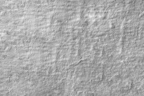 Gray abstract rough background casually painted wall fragment Stock Photos