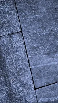 Gray abstract rough stone background. The texture of the stone wall. Close-up. Foto stock