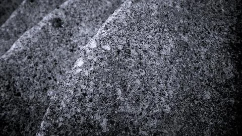 Gray abstract rough stone background. The texture of the stone wall. Close-up. Foto stock