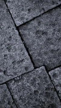 Gray abstract rough stone background. The texture of the stone wall. Close-up. Foto stock