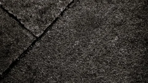 Gray abstract rough stone background. The texture of the stone wall. Close-up. Foto stock