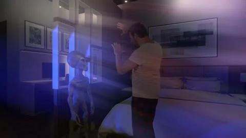 Gray Alien in a Bedroom Stock Footage 224213074